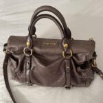 Authentic Grey Looks A Bit Purple In Person Miu Miu Vitello Leather Bow Bag With Gold Hardware And Removable Strap🤎🌆 - Image 5